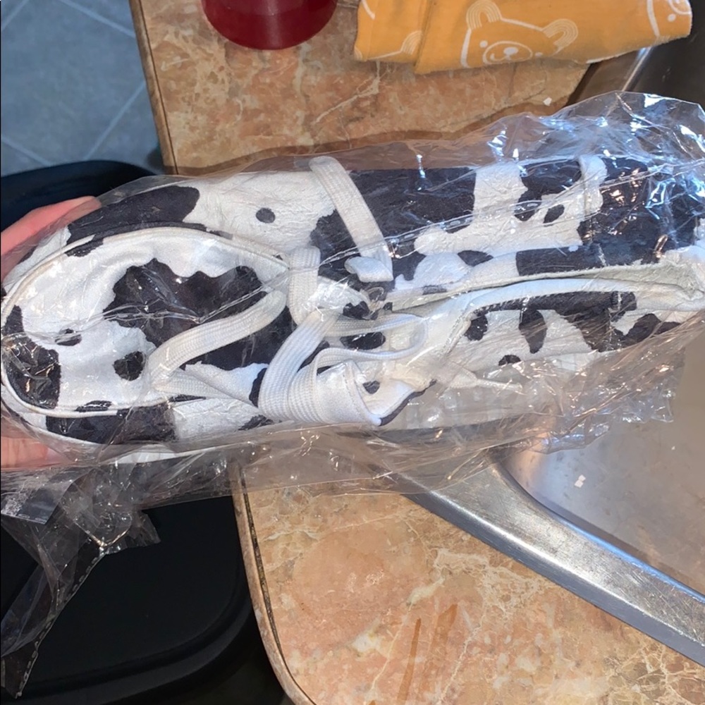 Cow print shoes.